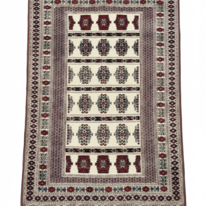 Hand-knotted tribal rug featuring ivory and cream central field with repeating burgundy and black geometric Gul medallions and a multi-layered ornamental border.