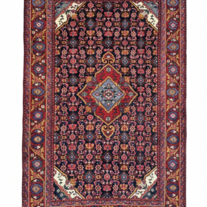 Full view of a 4' 2" x 6' 11" hand-knotted Persian Zanjan rug featuring a rhythmic series of geometric medallions on a vibrant red and deep navy field.