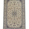 Full view of a 4' 12" x 7' 9" hand-knotted Persian Nain wool and silk rug featuring a central star medallion on an ivory field with navy blue borders.