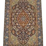 Hand-knotted Shahreza Persian rug featuring a central floral medallion on a rich field with intricate scrolling vines, palmettes, and a multi-layered ornamental border.