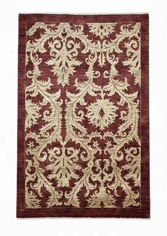Full overhead view of a rectangular hand-knotted Afghan Chobi wool rug featuring a deep burgundy field with a large-scale cream acanthus leaf pattern.