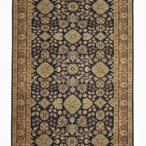Full overhead view of a rectangular hand-knotted Indian wool rug with a deep navy blue field and repeating large tan floral medallions.