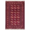 Full overhead view of a rectangular hand-knotted Turkmen wool rug featuring a deep burgundy field with repeating orange and white Gul medallions.