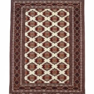 Full overhead view of a rectangular hand-knotted Turkmen wool rug with an ivory field and a repeating diagonal grid of burgundy and orange Gul medallions.