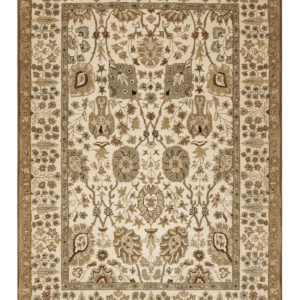 Full overhead view of a rectangular hand-tufted Indian wool rug with a cream field and delicate sage and tan botanical patterns.