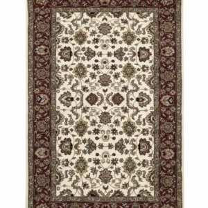 Full top-down view of a rectangular hand-knotted India Mir wool rug with a rich red field and an all-over repeating ivory Boteh (paisley) pattern.