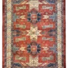 Full overhead view of a rectangular 5' 5" x 8' 1" hand-knotted Afghan wool rug with a rich madder red field and repeating navy geometric medallions.