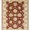 Full overhead view of a rectangular 5'6" x 8'3" hand-knotted India Chobi wool rug with a warm tan field and soft gold and sage floral patterns.