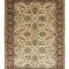 Full overhead view of a rectangular 5' 2" x 8' hand-knotted Indian wool rug with a rich burgundy field and dense all-over ivory and blue floral patterns.