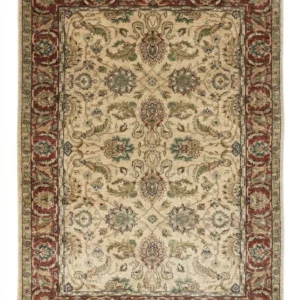 Full overhead view of a rectangular 5' 2" x 8' hand-knotted Indian wool rug with a rich burgundy field and dense all-over ivory and blue floral patterns.