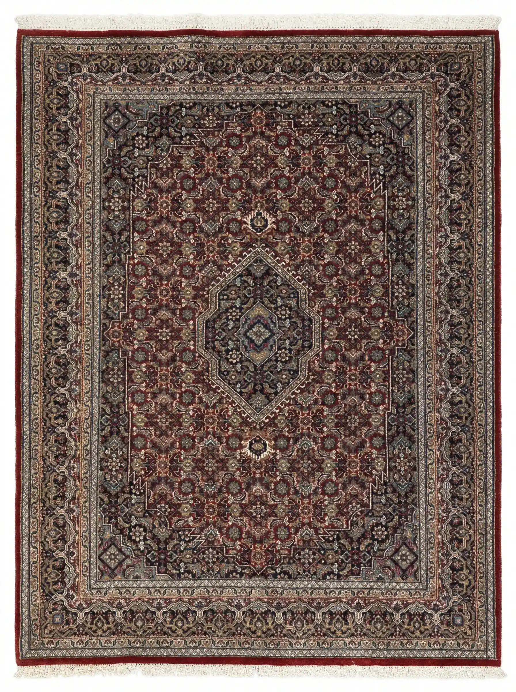 Full overhead view of a rectangular 5' 8" x 7' 1" hand-knotted Indian wool rug featuring a burgundy field and a massive cream and navy central medallion.