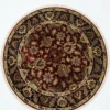 Full top-down view of a 6' x 6' circular hand-knotted Indian wool rug with a deep red field and an ornate navy and gold floral border.