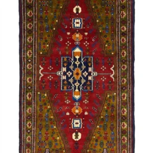 Full overhead view of a 4' 5" x 9' 3" hand-knotted Persian Koliai wool rug featuring a large stepped hexagonal medallion on a vibrant red and olive-gold field.