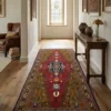Bright modern hallway with wood floors and white walls, featuring a 4' 5" x 9' 3" Persian Koliai rug as a central focal point.