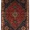 Full overhead view of a rectangular 5' 4" x 7' 3" hand-knotted Persian Qashqai wool rug with a large central diamond medallion on a rich red and navy field.