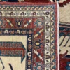 Close-up view of the underside of an Afghan Kazak wool rug, showing the visible individual hand-tied knots and authentic village construction.