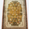 Full overhead view of a 9' x 6' hand-knotted China Ning wool rug with a vibrant saffron gold field, blue crane motifs, and a terracotta border.