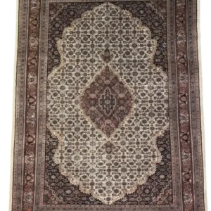 Full overhead view of a 5' 7" x 8' hand-knotted Indian wool rug featuring a large cream multi-lobed medallion on a dark plum and tobacco brown field.