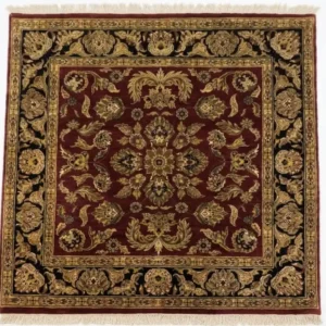 Full overhead view of a 6' 3" x 6' 6" square hand-knotted Indian wool rug with a rich crimson red field and an ornate black botanical border.
