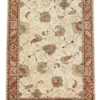 Full overhead view of a rectangular 6' x 8' 11" hand-knotted Indian wool rug with a luminous ivory field and large-scale terracotta and sage floral patterns.