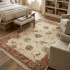 Bright modern bedroom with a wooden bed frame and neutral linens, featuring a 6' x 8' 11" ivory and terracotta Indian rug centered at the foot of the bed.