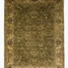 Full overhead view of a 6' x 9' 2" hand-knotted Indian wool rug featuring a bright golden-yellow field with dense floral patterns and an ornate tan border.