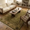 Bright modern living room with a neutral armchair and light wood floors, featuring a 6' x 9' 2" yellow and gold Indian wool rug.