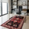 Cozy rustic living room with a leather armchair and light wood floors, featuring a 5x8 Iran Kuliai tribal rug as a central focal point.