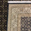 Close-up view of the underside of an Indian wool rug, showing the visible individual hand-tied knots and authentic textile construction.