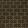 Macro shot of the dense hand-knotted wool pile showing intricate olive-gold and tan geometric motifs on a deep black background.