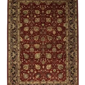 Full overhead view of a 6' x 9' hand-knotted Indian wool rug featuring a saturated ruby red field with intricate gold and ivory scrolling floral patterns and an ornate border.