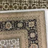 Close-up view of the underside of a white Indian wool rug, showing the visible individual hand-tied knots and authentic textile construction.