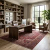 Professional home office with a dark wood desk and glass windows, featuring a large red Persian Heriz rug providing a grounded anchor.