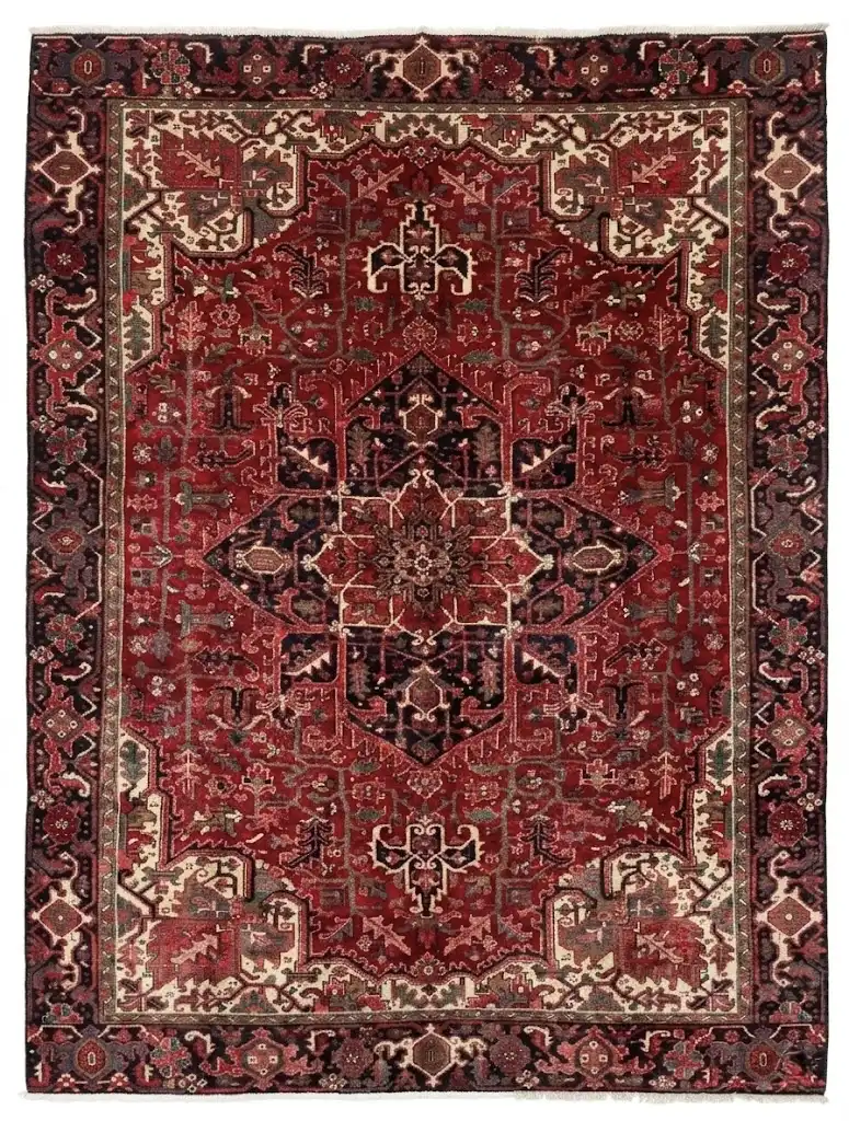Full overhead view of an 8' 6" x 11' 1" hand-knotted Persian Heriz wool rug with a vibrant red field, large geometric medallion, and dark indigo corners.