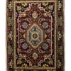 Overhead view of a 1' 3" x 2' 0" hand-knotted Indian wool rug with a detailed multi-layered medallion design in red, navy, and ivory.