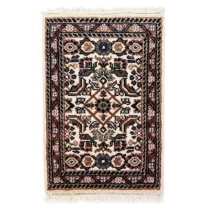 Overhead view of a 1' 3" x 2' 0" hand-knotted Indian wool rug featuring an ivory field with a central diamond medallion and earthy botanical accents in sage, copper, and navy.