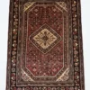 Full overhead view of a 6' 10" x 10' 4" hand-knotted Iranian Hosinabad wool rug with a sharp cream and red central diamond medallion.