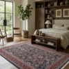 Luminous bedroom with a walnut bed frame and beige linens, featuring a large Persian Mood rug providing a warm foundation under the bed.
