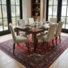 Sophisticated dining room featuring a long wooden table and beige upholstered chairs, centered over an intricate 7x10 Sarough area rug.
