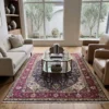 Luminous contemporary living room with a beige sofa and glass coffee table, anchored by a 7x10 neutral Tabriz Persian rug on light wood floors.