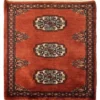 Overhead view of a 1' 6" x 1' 10" hand-knotted Pakistan Bokhara wool rug in rust red with three central ivory and black gul medallions.