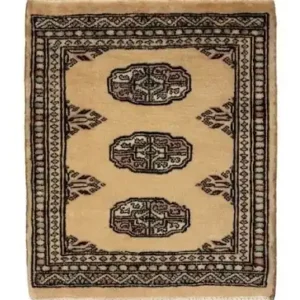 Overhead view of a 1' 7" x 1' 10" hand-knotted Pakistan Bokhara wool rug featuring a luminous gold field and three central gul medallions.