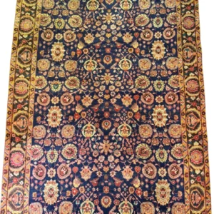Full top-down overview of a 7' 2" x 10' 9" hand-knotted Iranian Khalkhal wool rug with an all-over floral layout on a deep midnight blue field with golden-yellow borders.