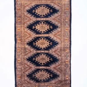 Overhead view of a 1' 6" x 3' 0" hand-knotted Pakistan Jaldar wool rug featuring a deep navy field with five central diamond guls and a sand-gold border.