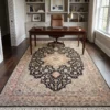 6' 10" x 10' 0" Heriz Persian wool rug anchoring a luxury home office with a dark wood desk and leather chair.