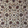 Close-up of gazelle motifs, floral vines, and fine wool construction on an ivory Arak Golpayegan Persian rug.