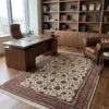 Arak Golpayegan wool carpet styled in a executive corner office under a modern dark wood desk and tufted leather armchair.