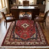 Persian Hamedan area rug styled in an executive office under a walnut desk and leather guest chairs.