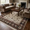 7' 1" x 9' 7" Persian Mashhad wool rug styled in a cozy living room under a coffee table between velvet armchairs and a sofa.