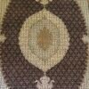 Close-up of the stepped oval medallion and fine Herati fish pattern on a hand-knotted Persian Mahi wool rug.